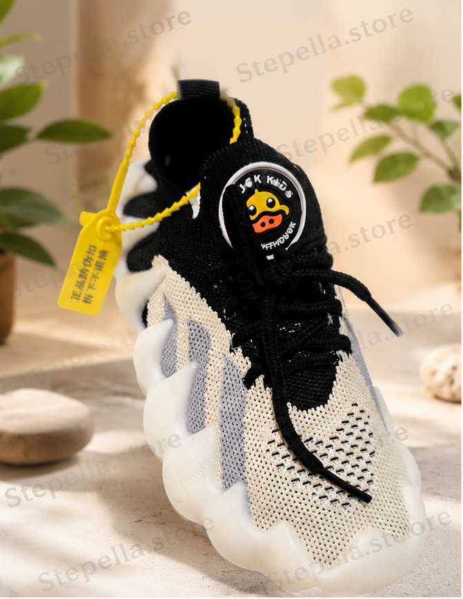 Give little feet the perfect combination of comfort, flexibility, and playful style with these modern kids' sneakers from Stepella.store.